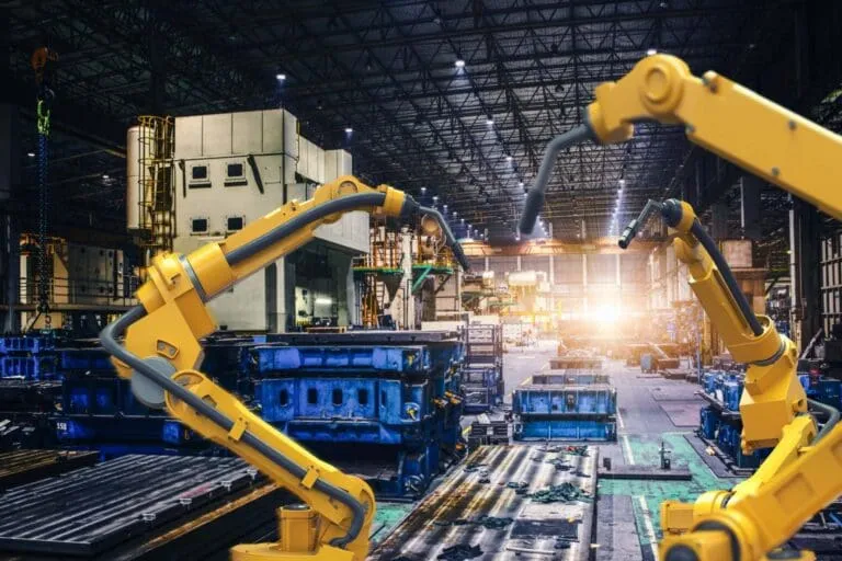 Heavy automation robot arm operating in a smart factory production line