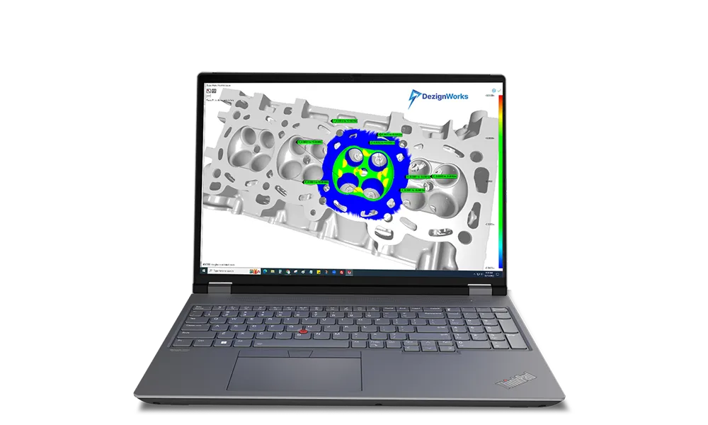 DezignWorks reverse engineering software on a laptop, extracting features from a scanned engine cylinder head shown with a deviation color map